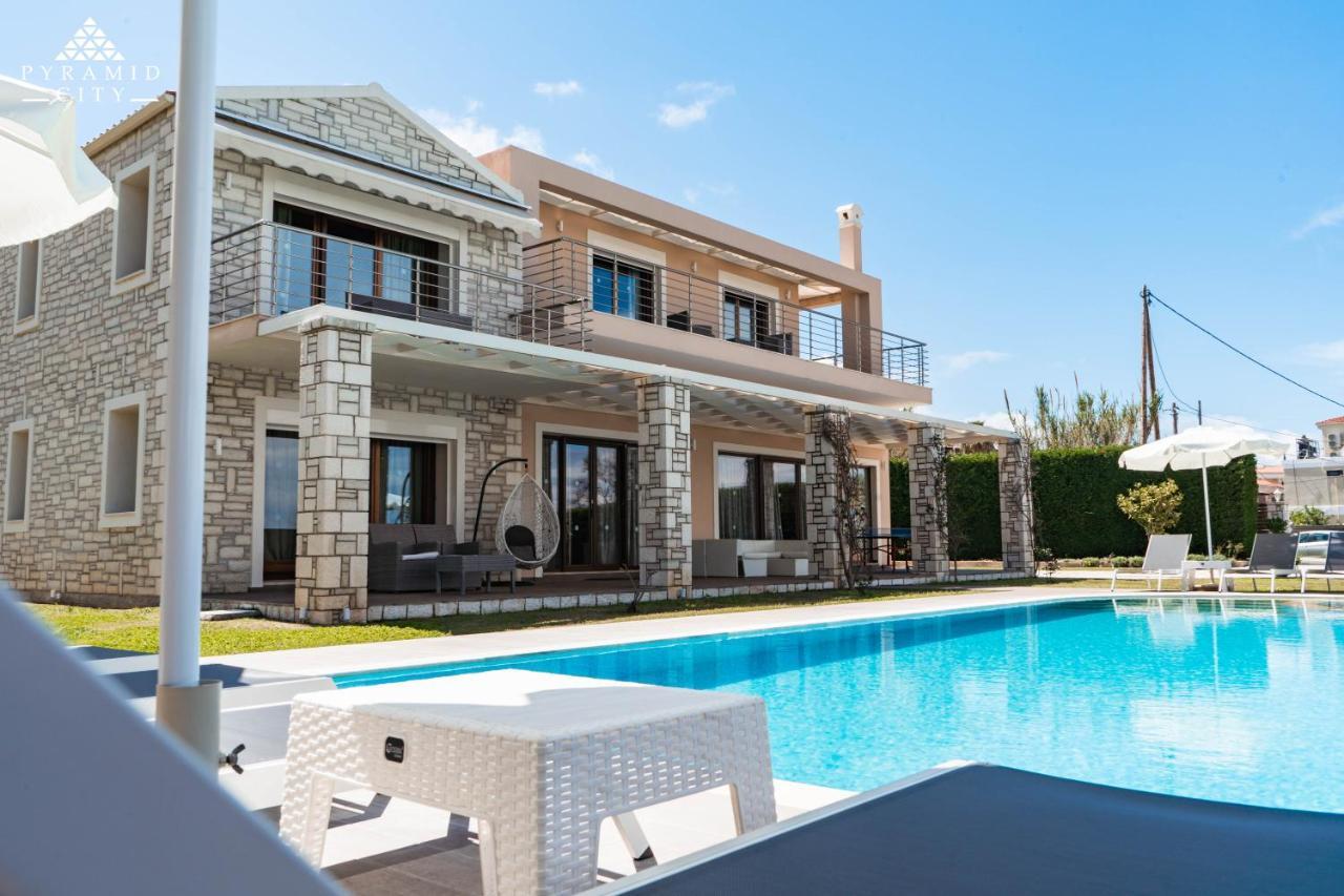 Luxury Villa Hera - Beachfront Roda  Bagian luar foto