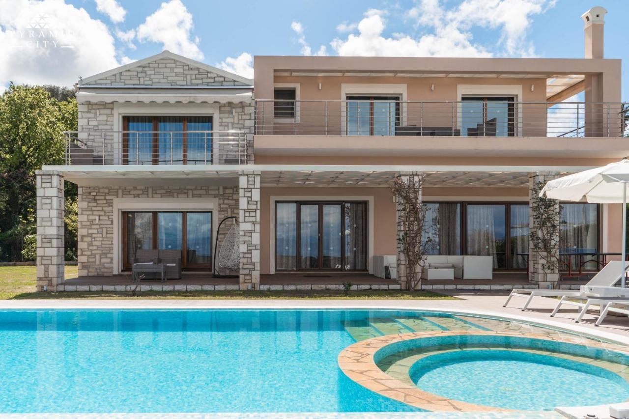 Luxury Villa Hera - Beachfront Roda  Bagian luar foto